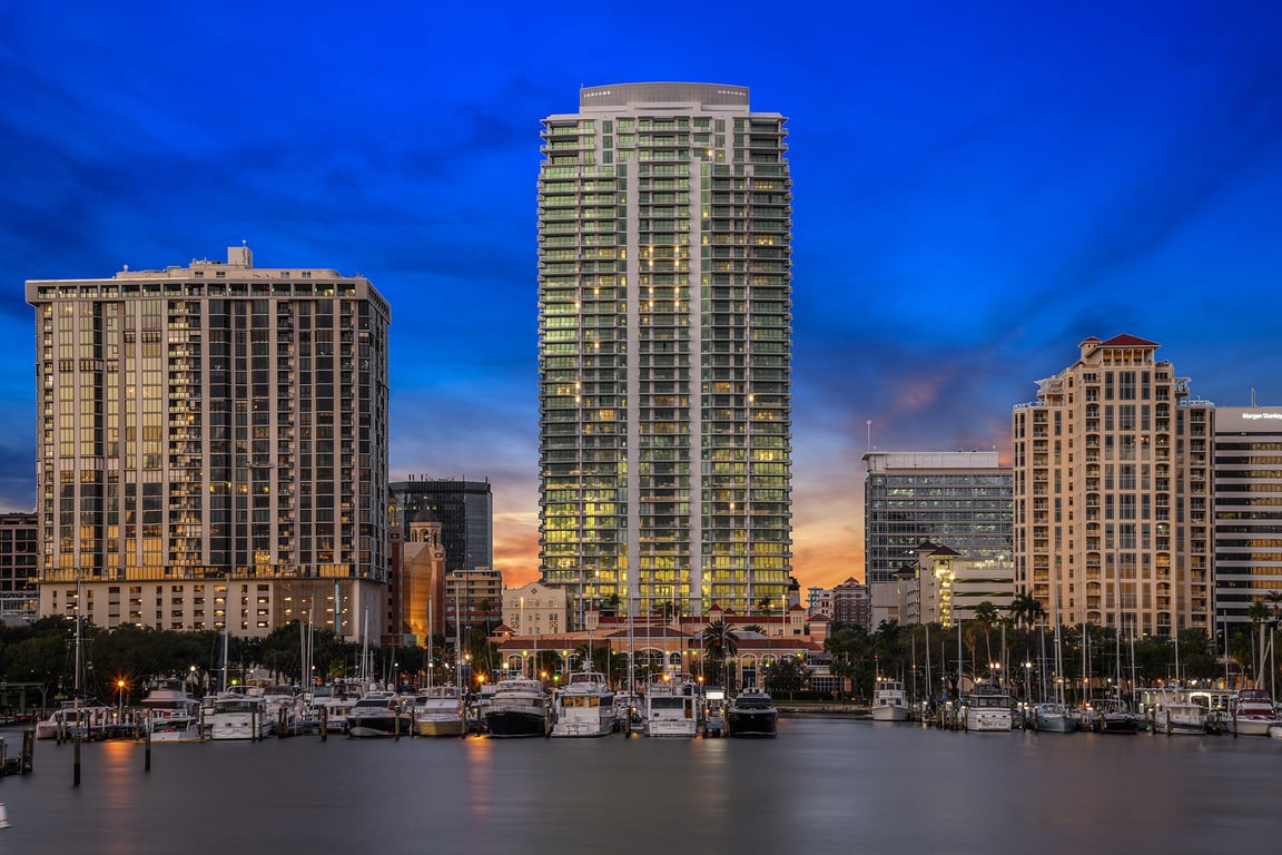 Highrise condo building in Downtown St. Petersburg, Florida Marina with boats. POV: from the bay looking towards the city.